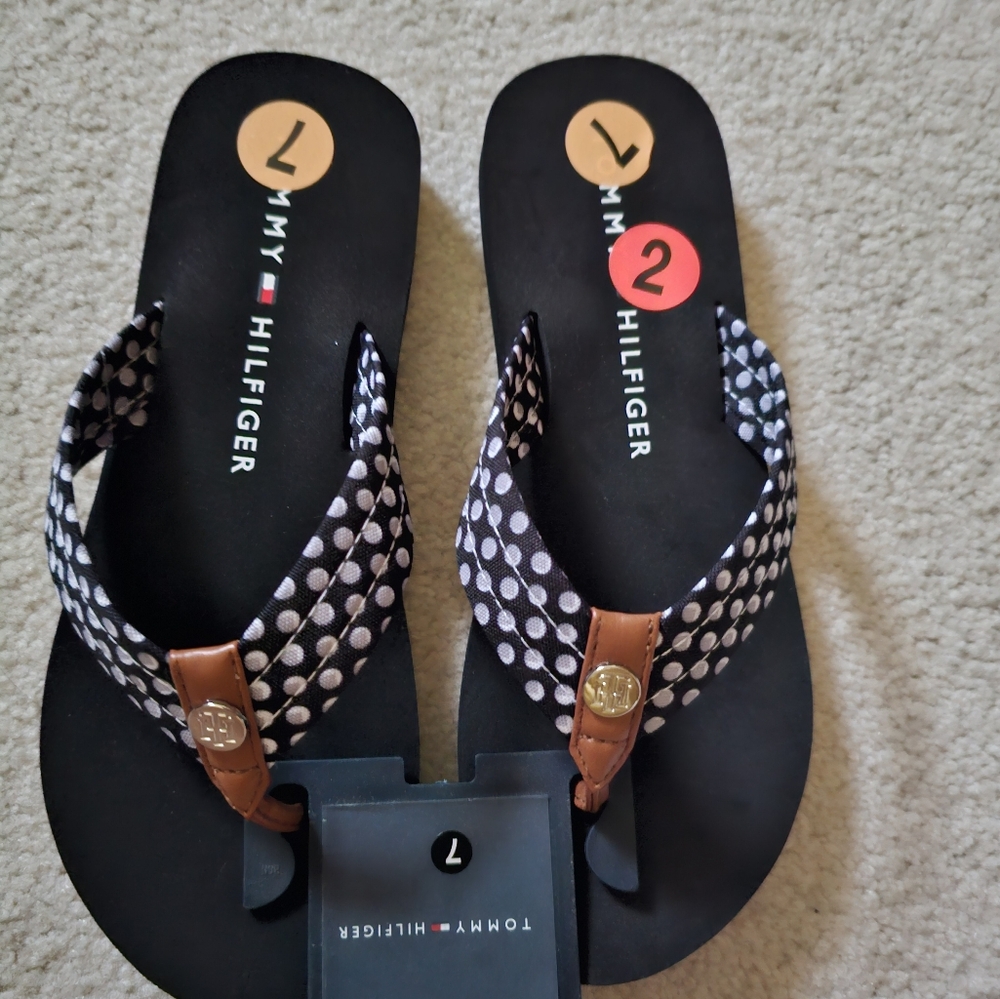 Tommy Hilfiger flips